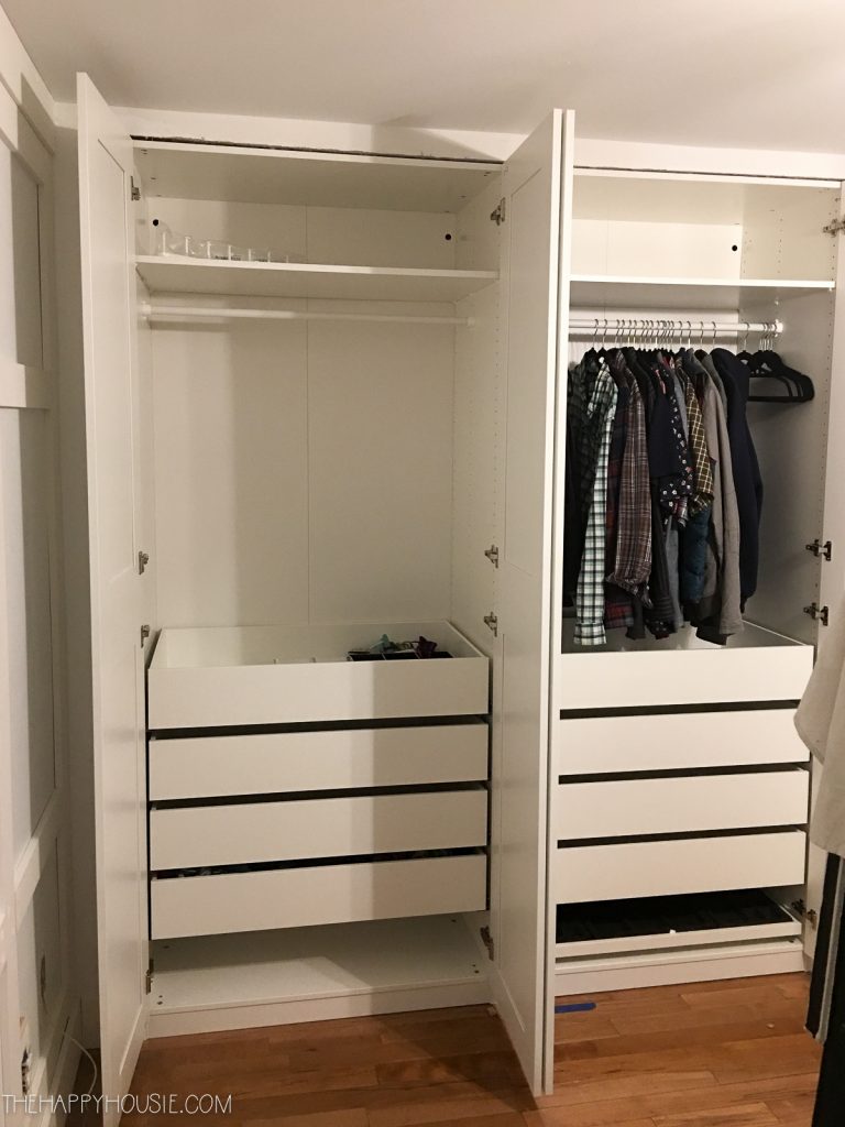 The Ikea PAX System being installed in the closet.