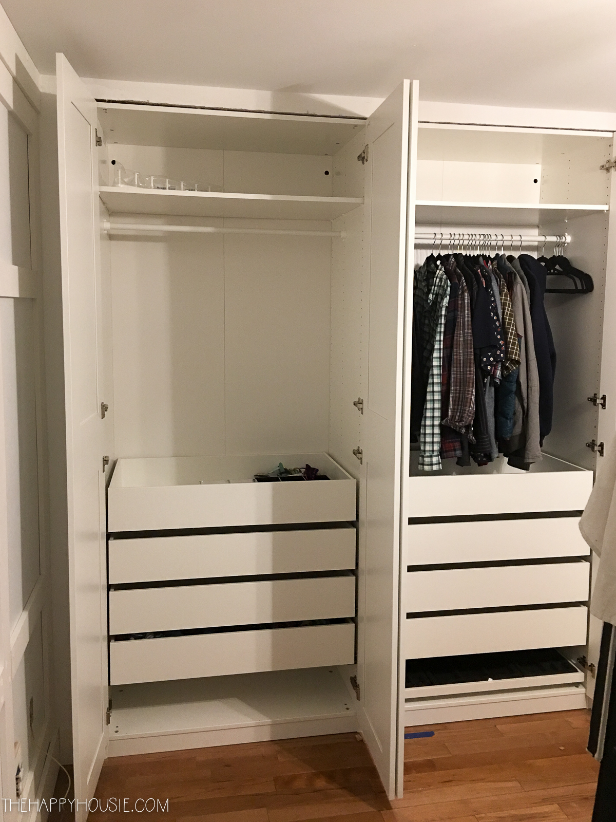 an Ikea PAX wardrobe unit recently installed into an opening in a bedroom makeover