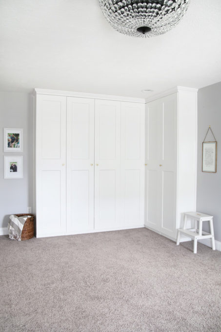 an Ikea PAX wardrobe unit with doors used in the corner of the room - Ikea PAX corner unit with doors
