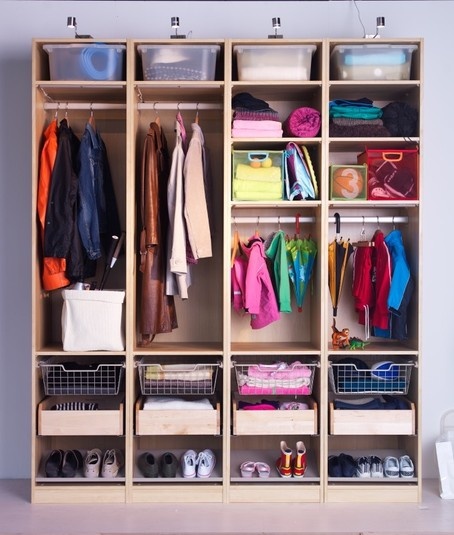 a collection of three 19" Ikea PAX wardrobe units without doors that creates highly efficient mudroom storage