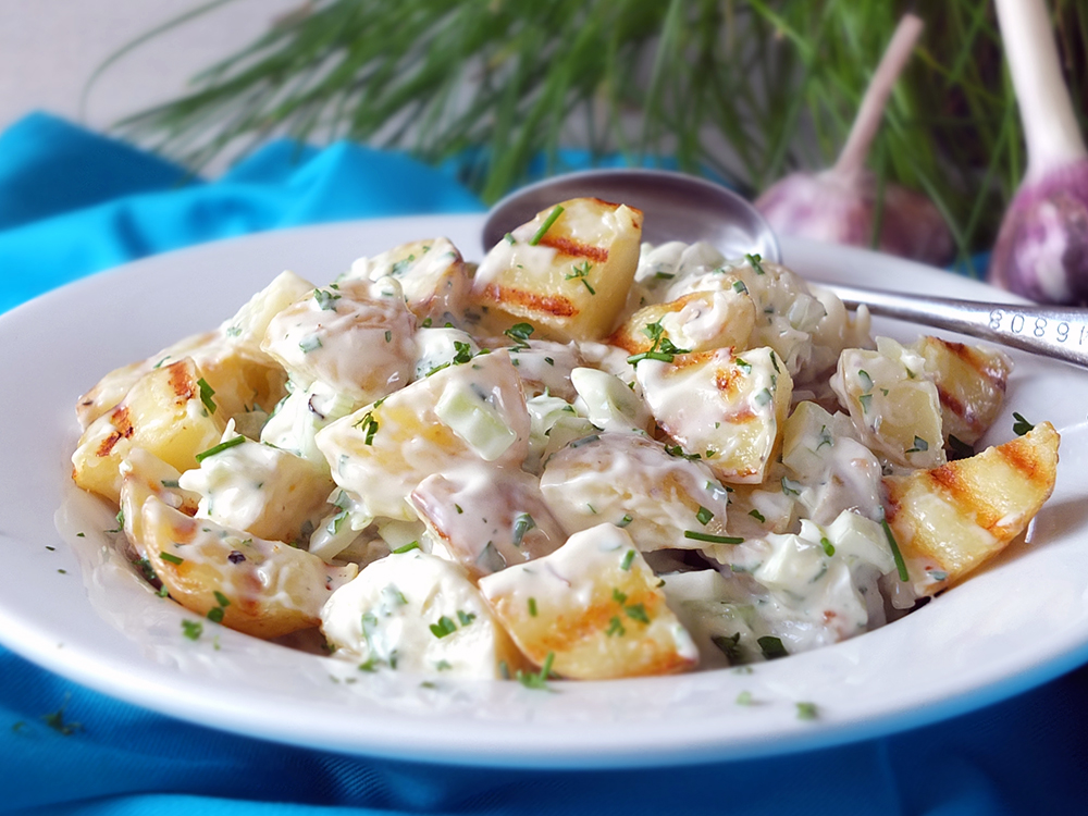 A plate of garlic grilled potato salad.