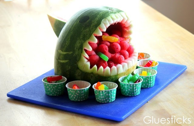 A shark made out of a watermelon.