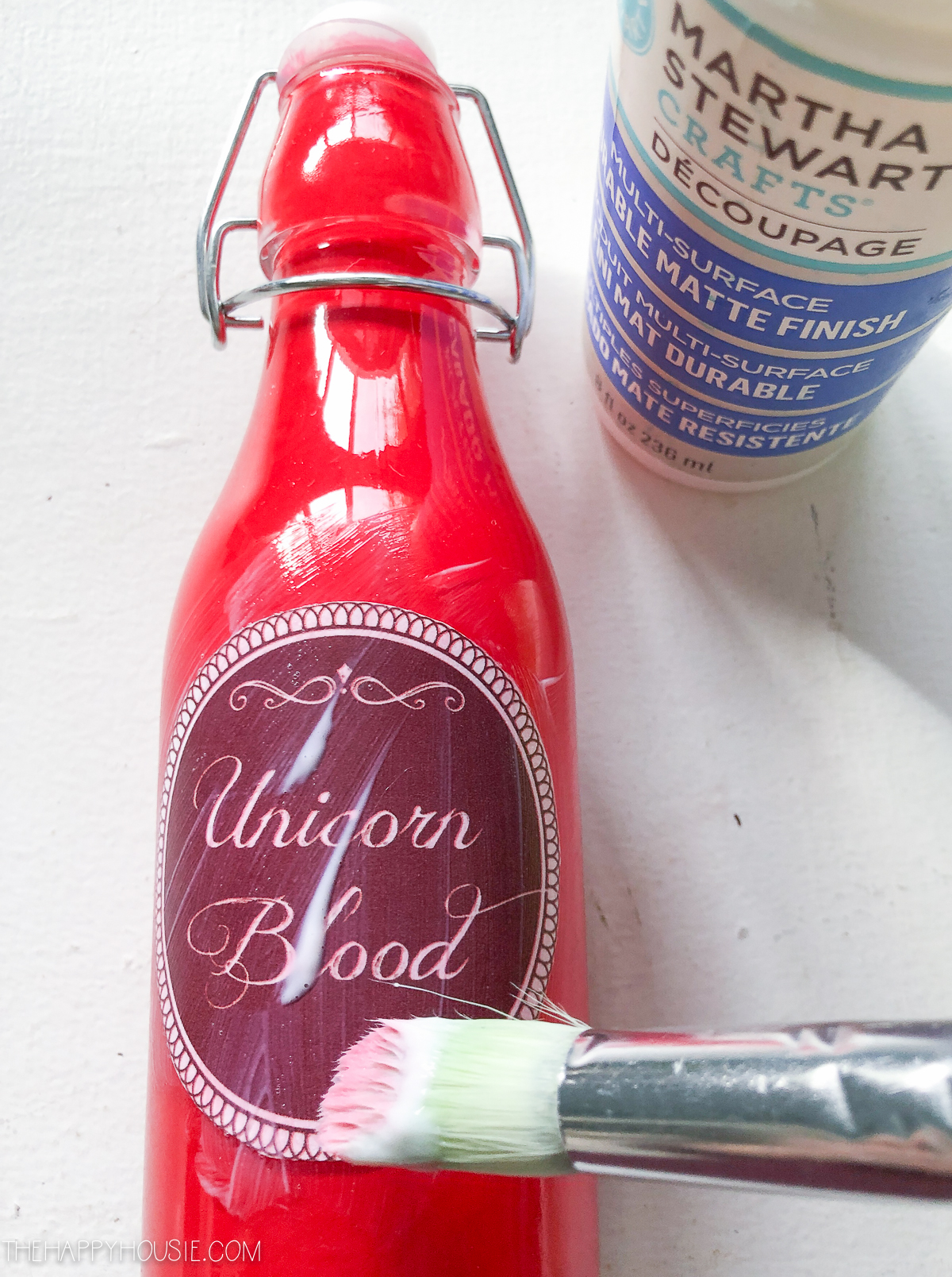 The label on the red paint that says Unicorn Blood.