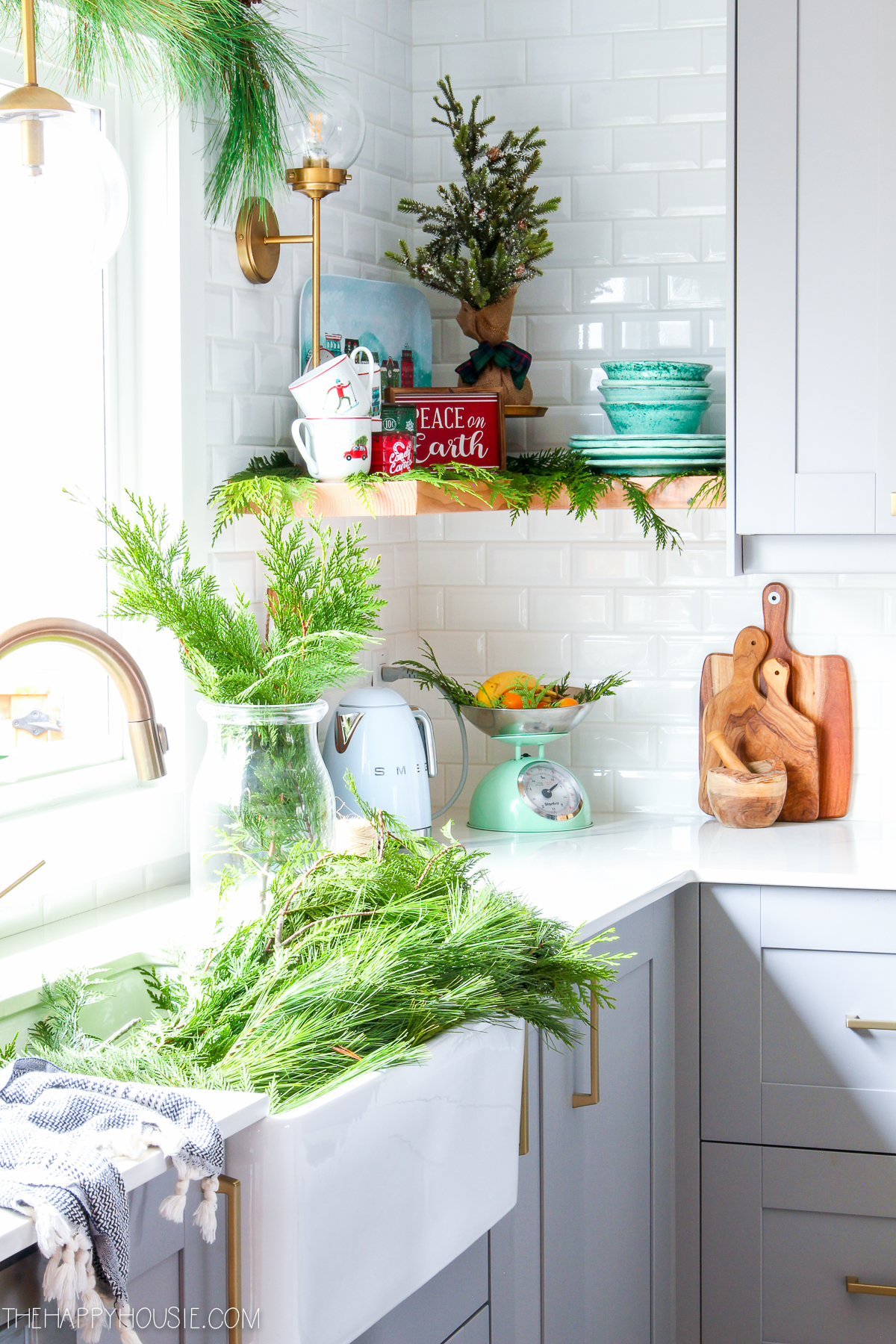Cedar boughs are in the sink in the kitchen.