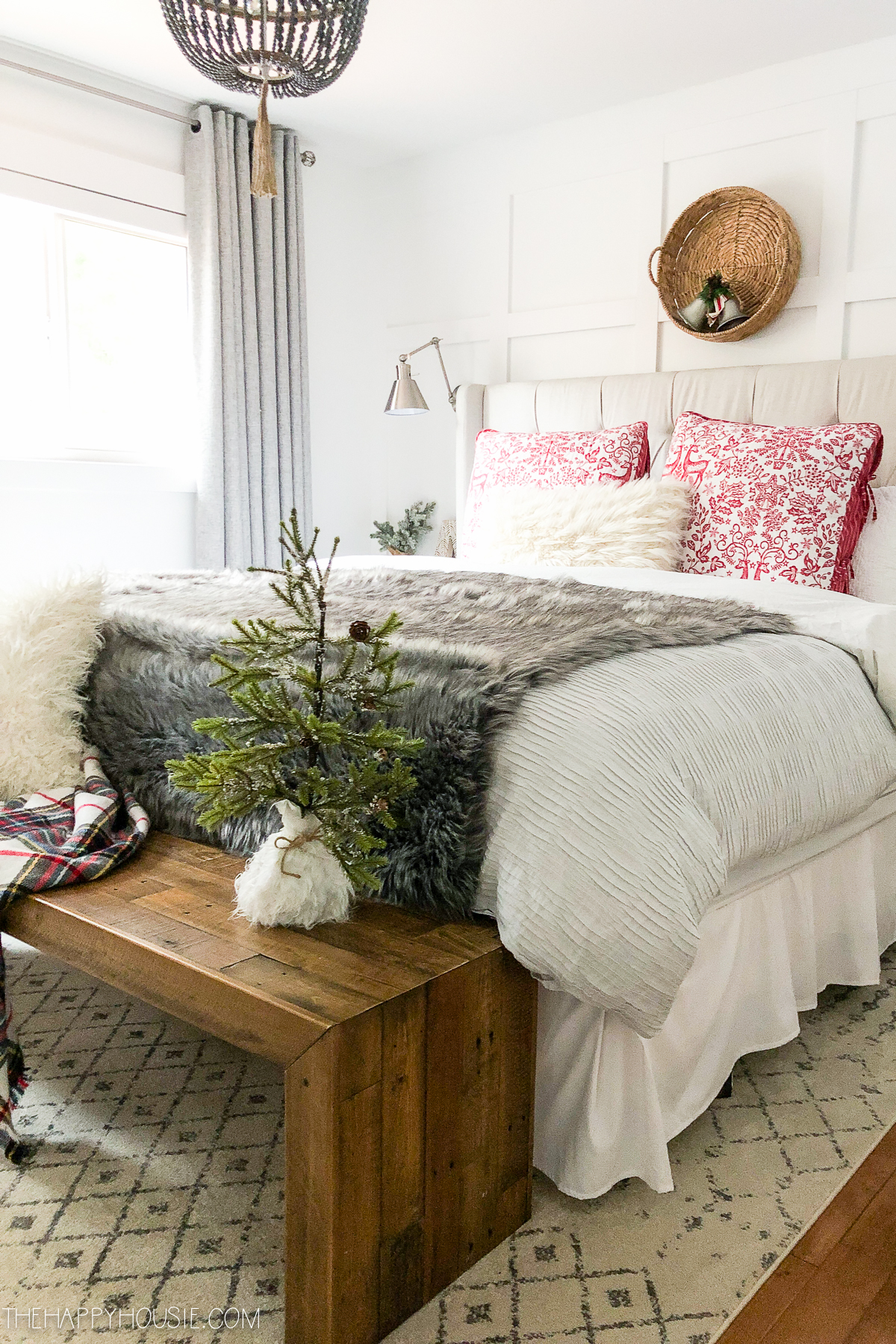 Faux fur throw is on the bed in the master bedroom.