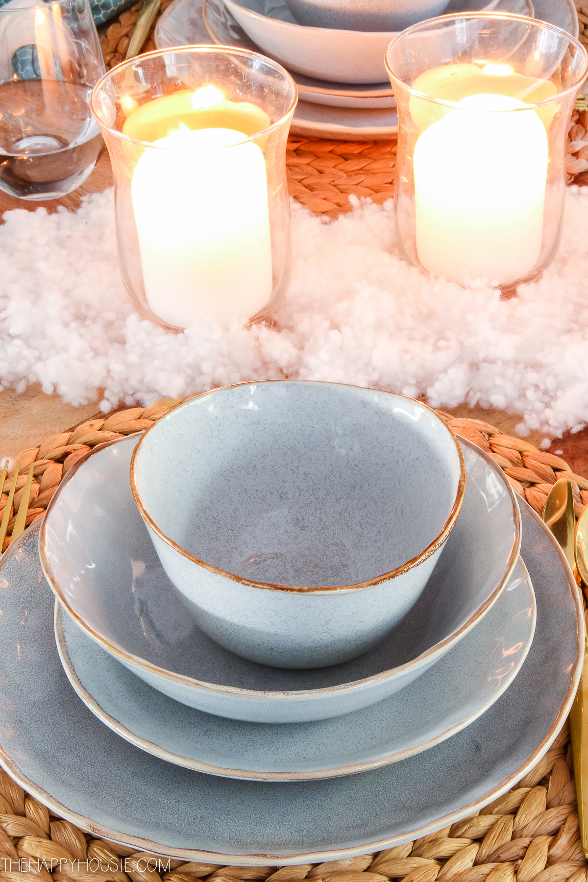Ceramic dishes in a soft grey with a light brown edge.