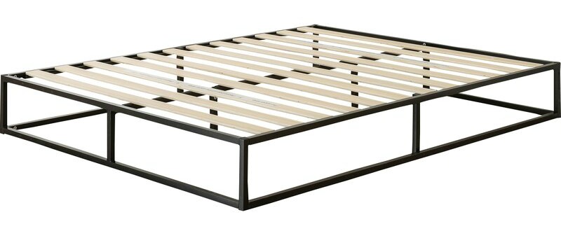 A bed frame for the room.