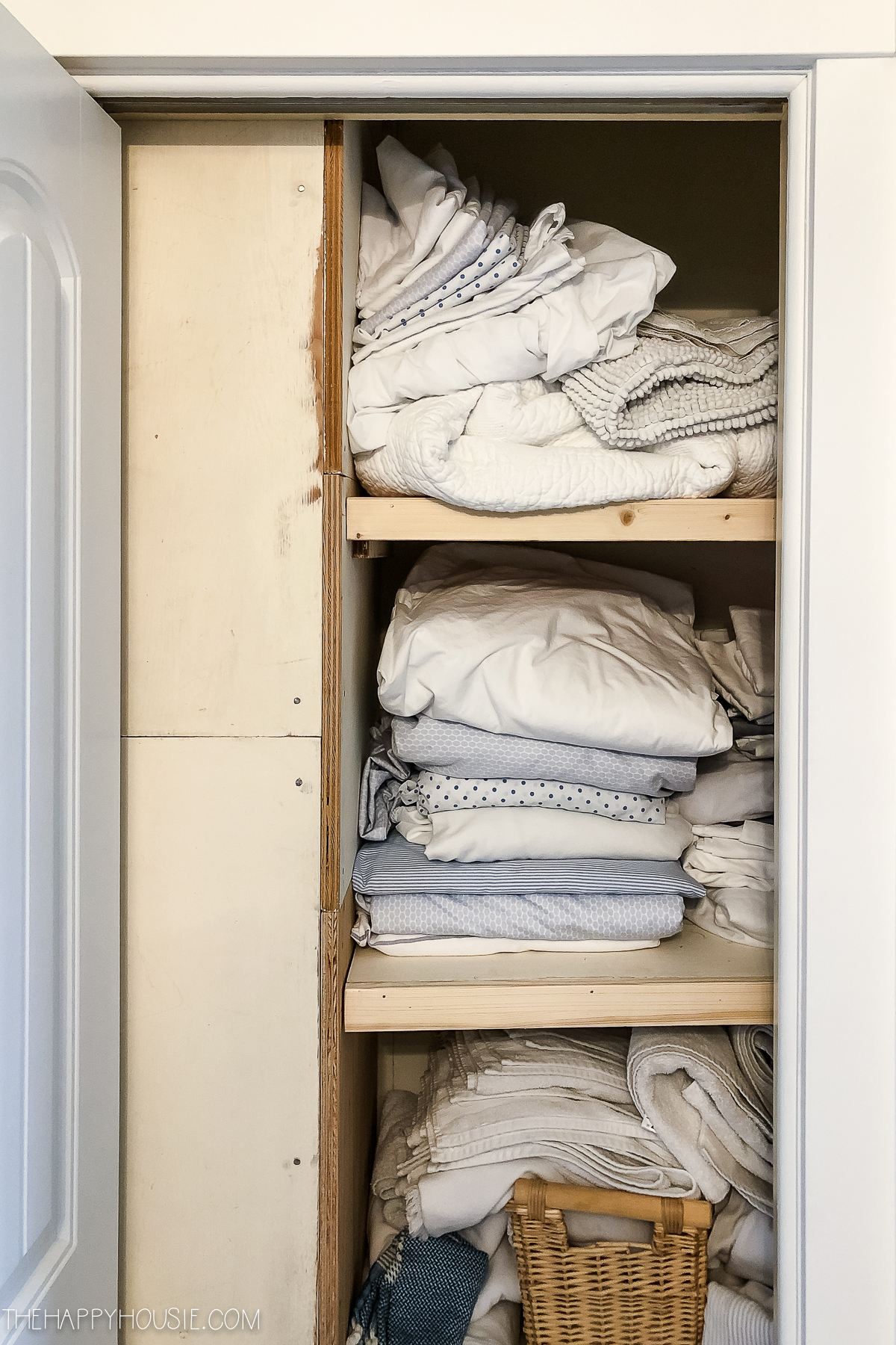 Sheets and towels in the linen closet.