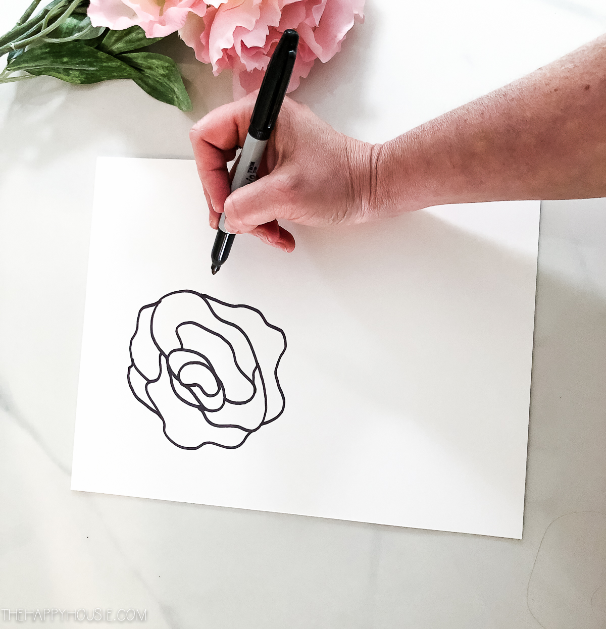 The drawing on a white paper.