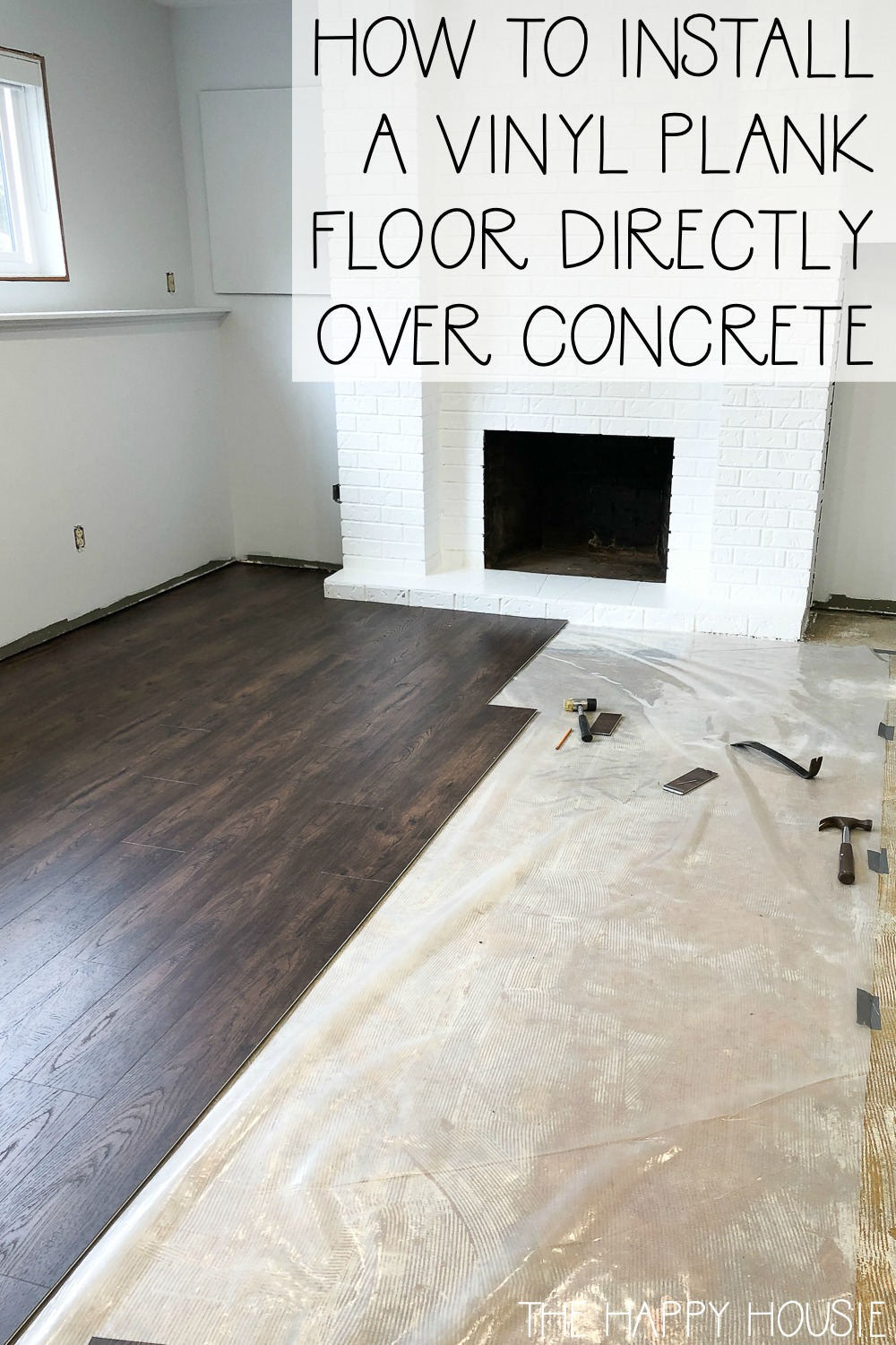 a large room where vinyl plank flooring is being installed over top of a concrete subfloor