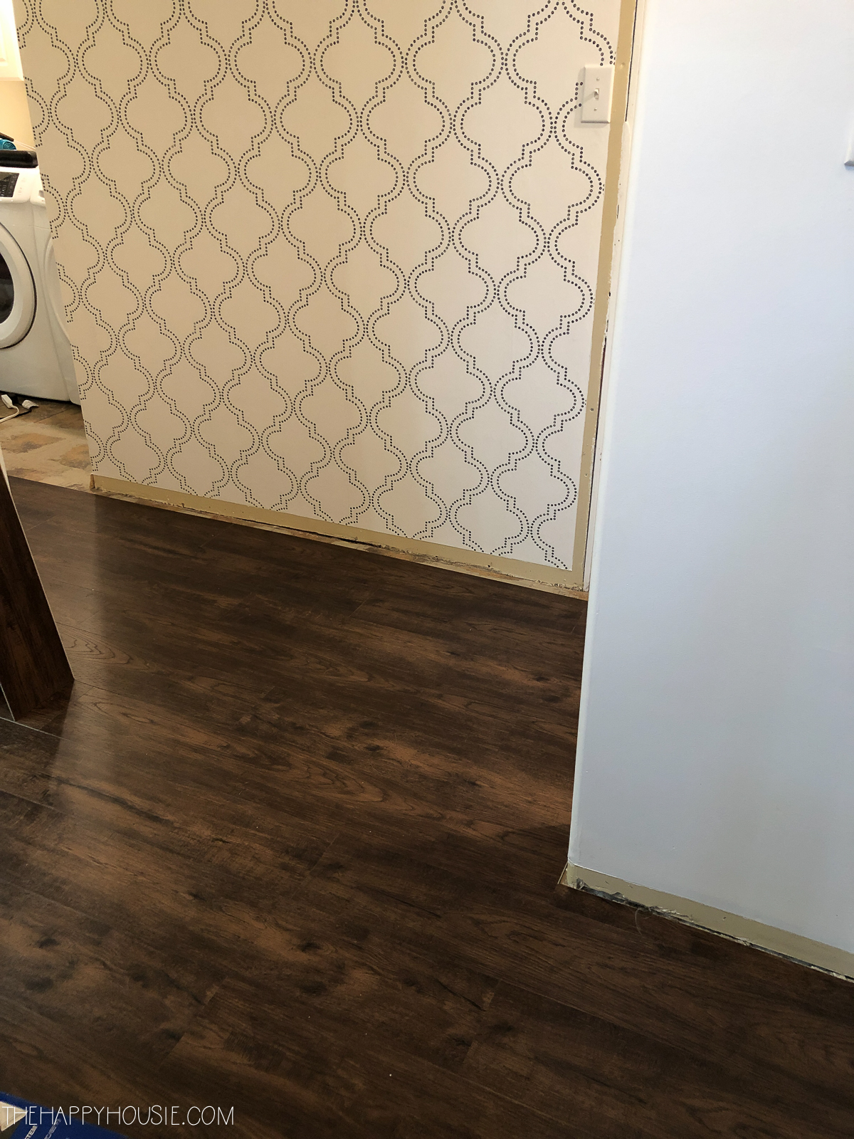 The flooring in with a wooden look.