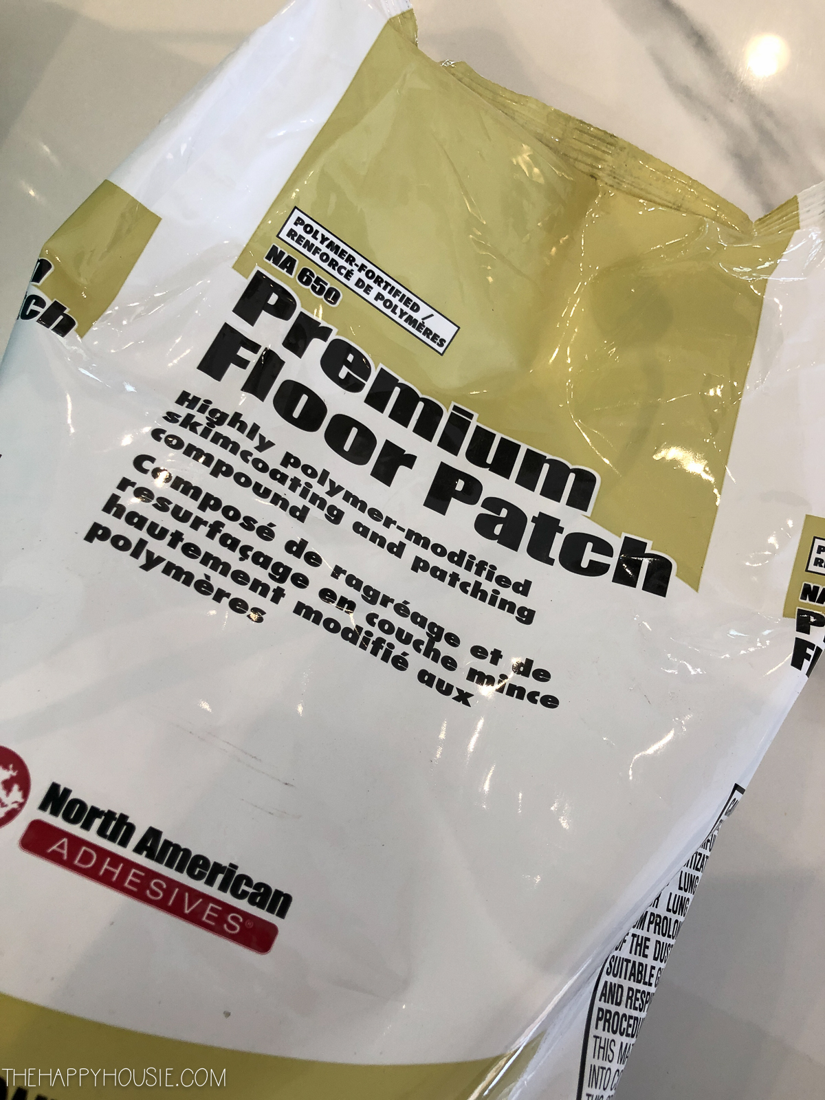Floor patch material in a bag.
