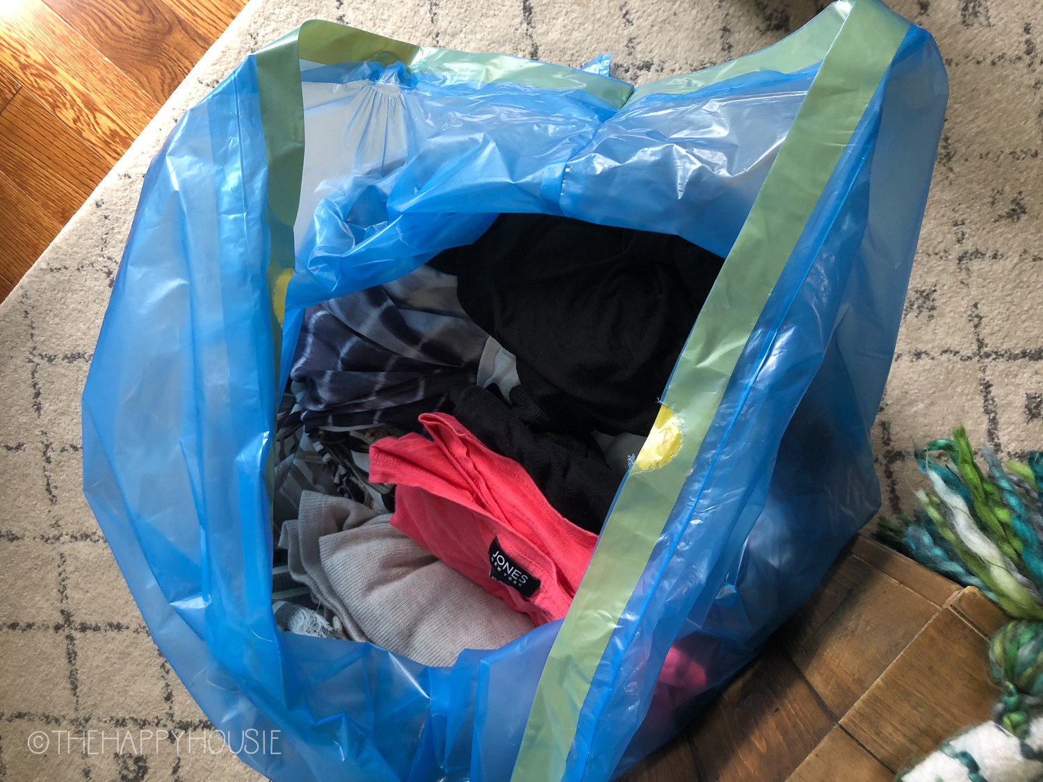 A bag full of clothes for donation.