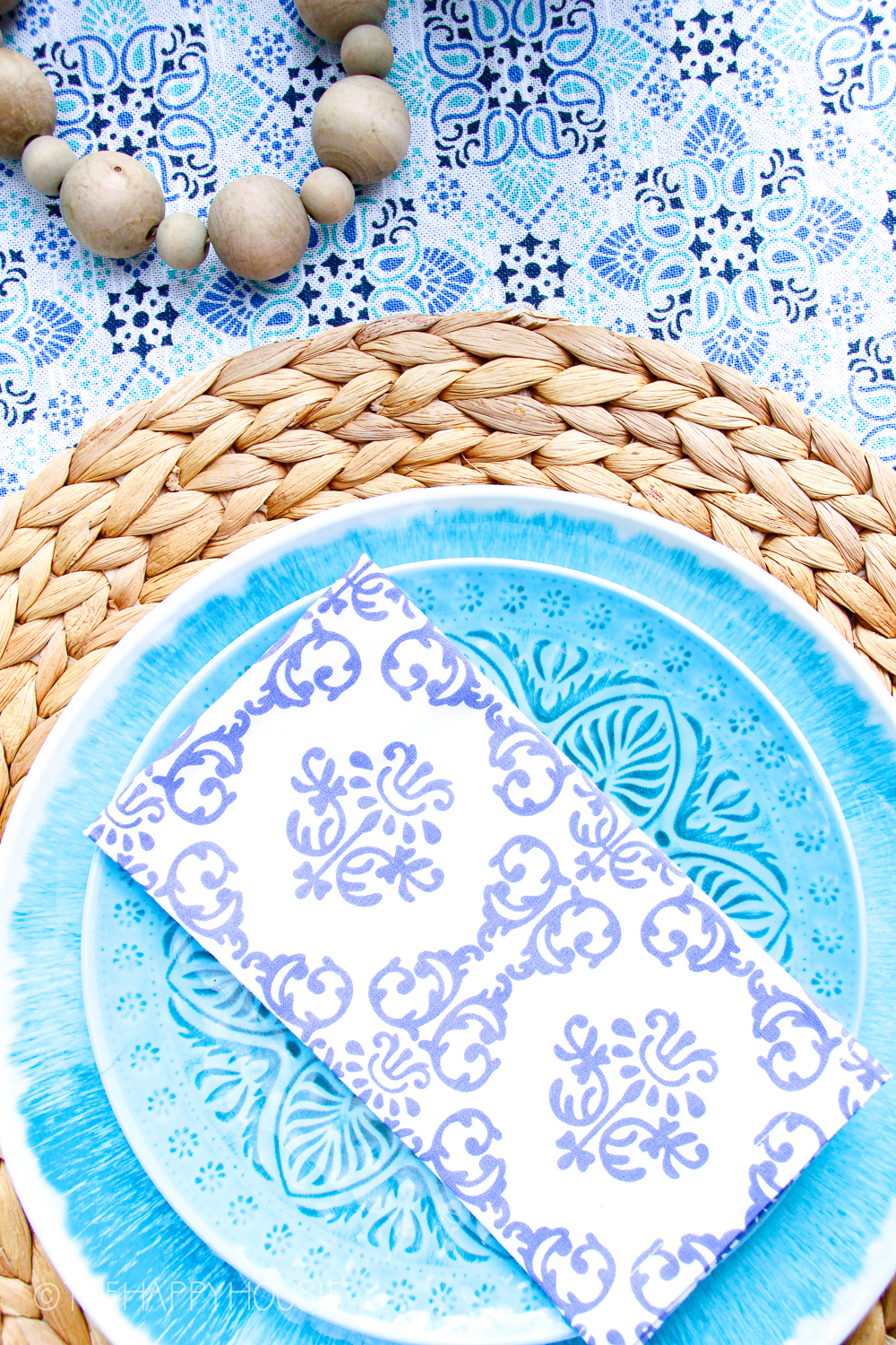 Blue and white plates with a blue and white napkin.