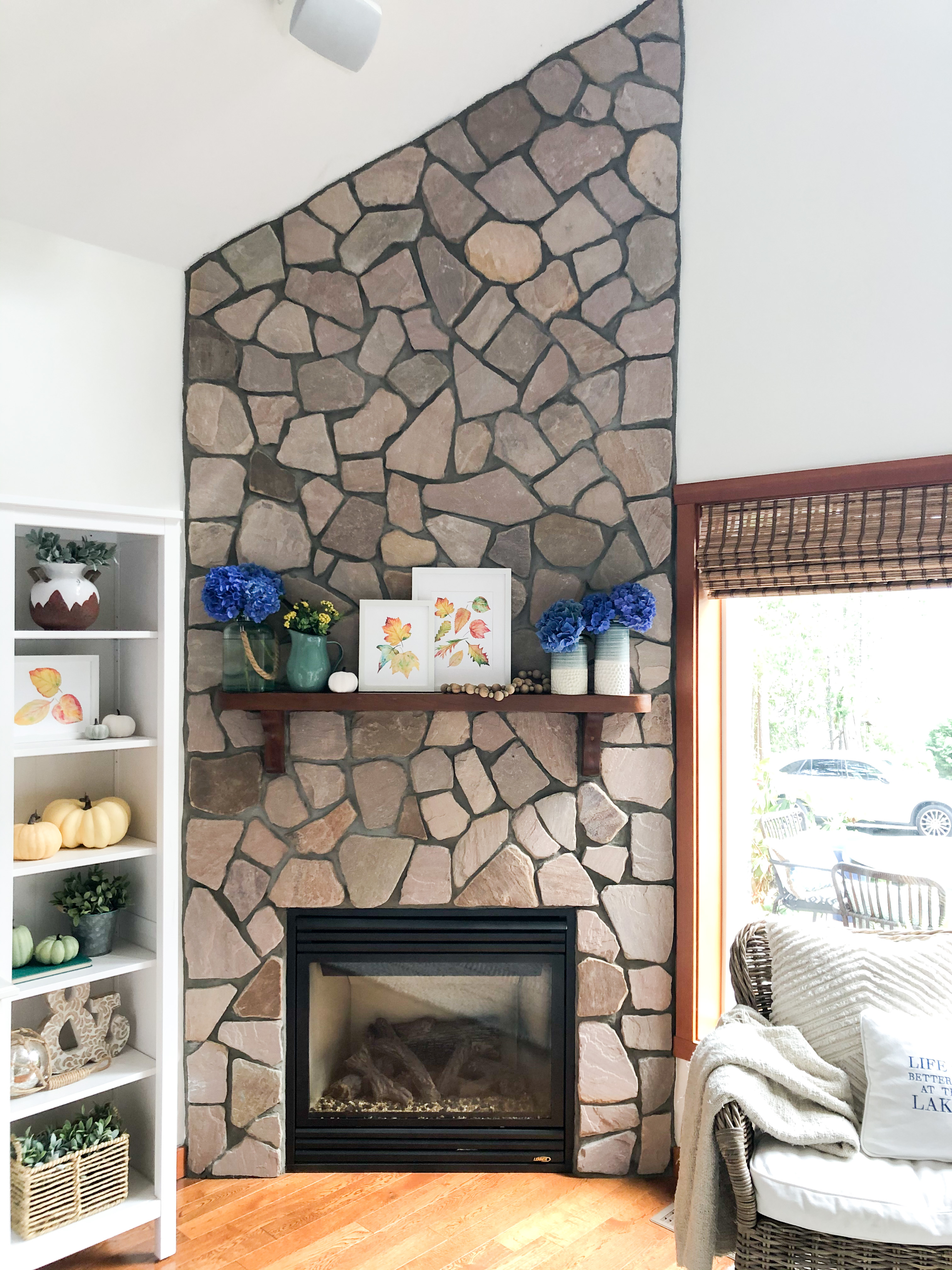 A natural stone fireplace.