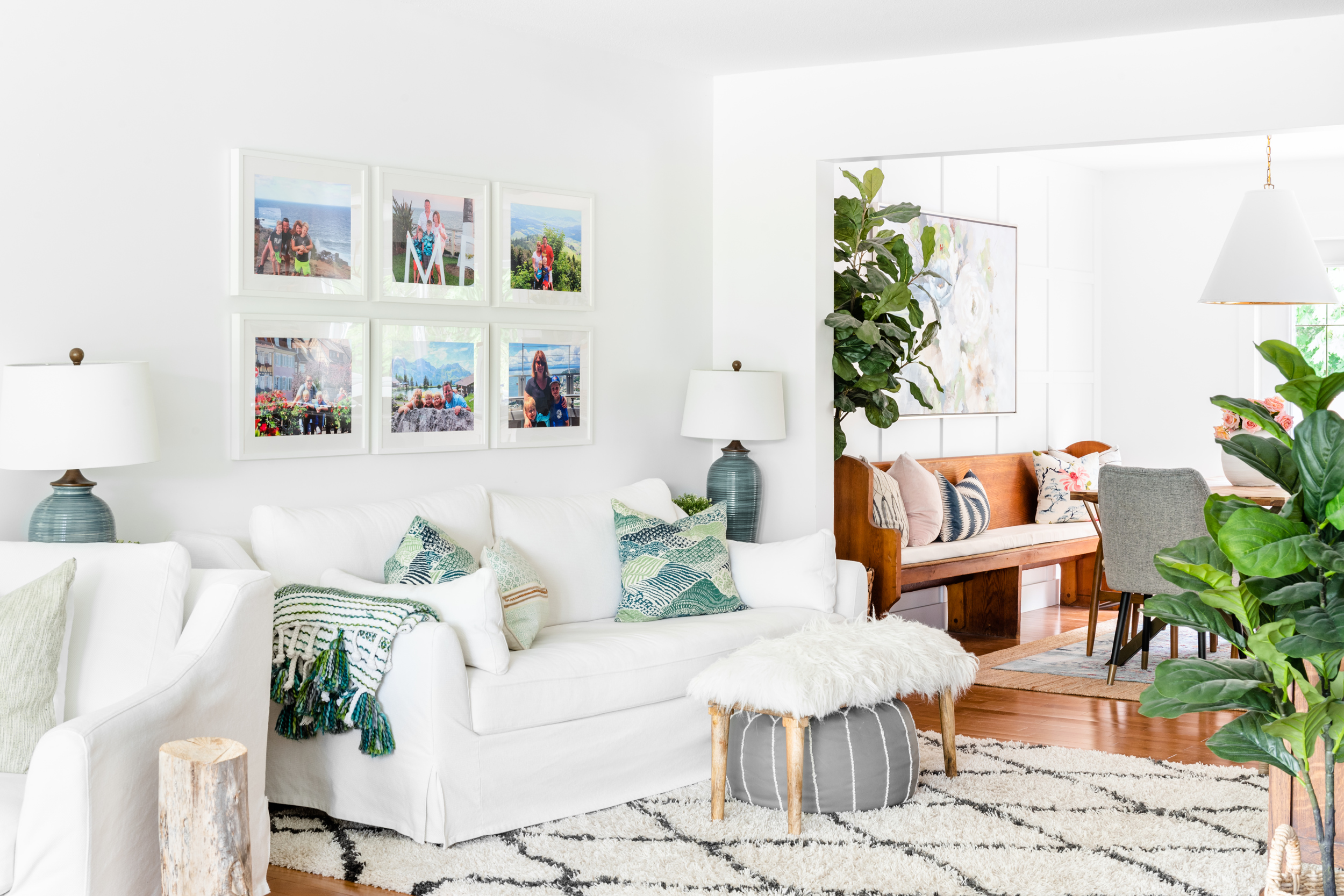 A family room space with a white slipcovered Ikea Farlov sofa