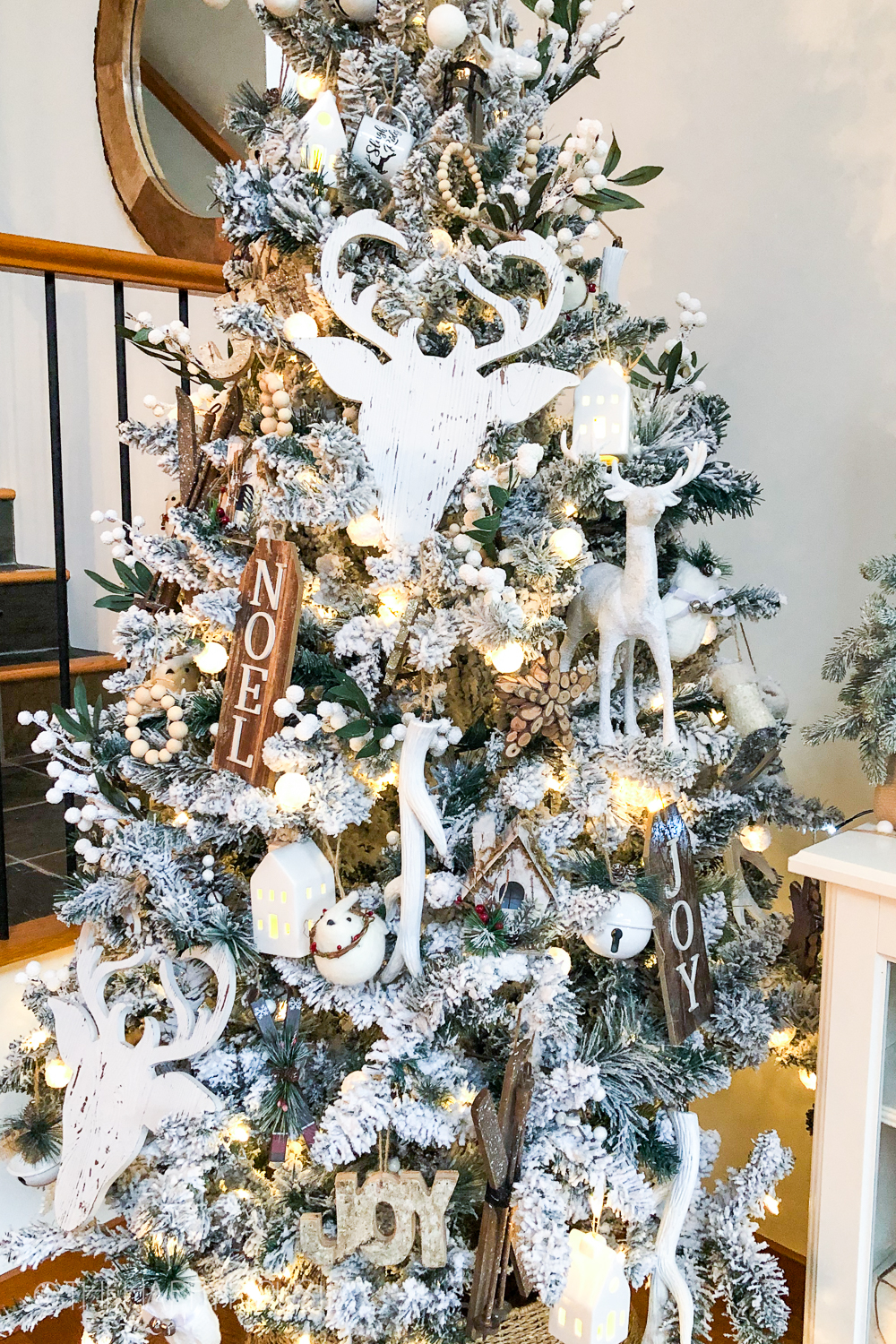White Flocked Christmas Tree With Neutral Wood Accents