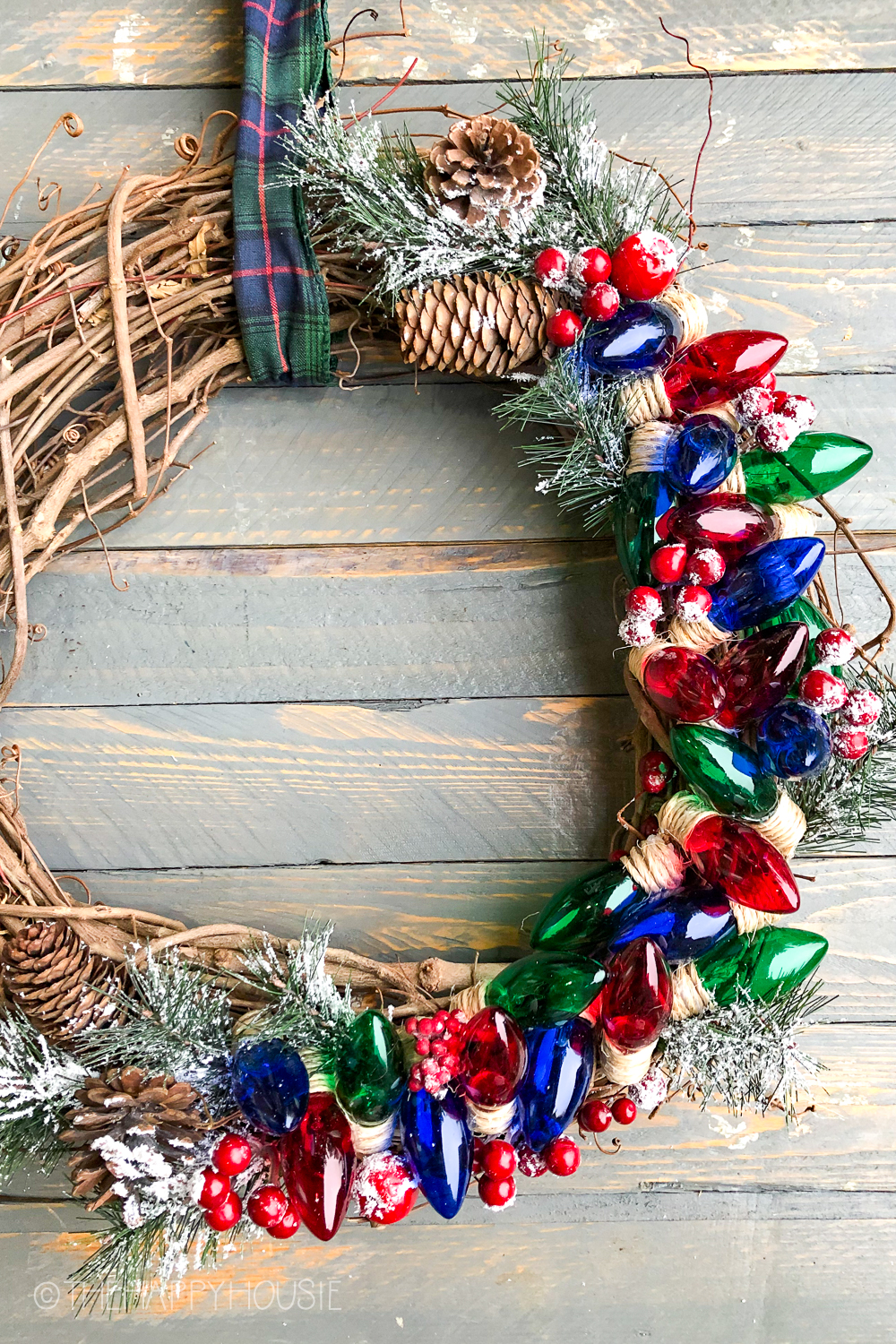Holiday colours of red, green and blue on the wreath.