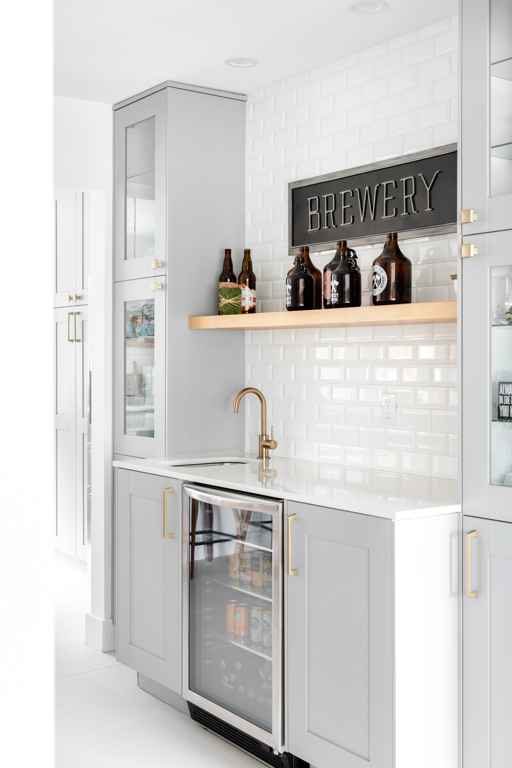 a build in bar and beverage centre with Ikea Grimslov Gray cabinets and open wood shelves