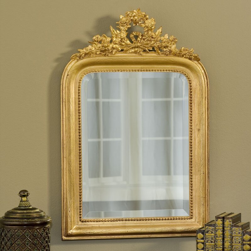 A gold antique mirror from Wayfair.