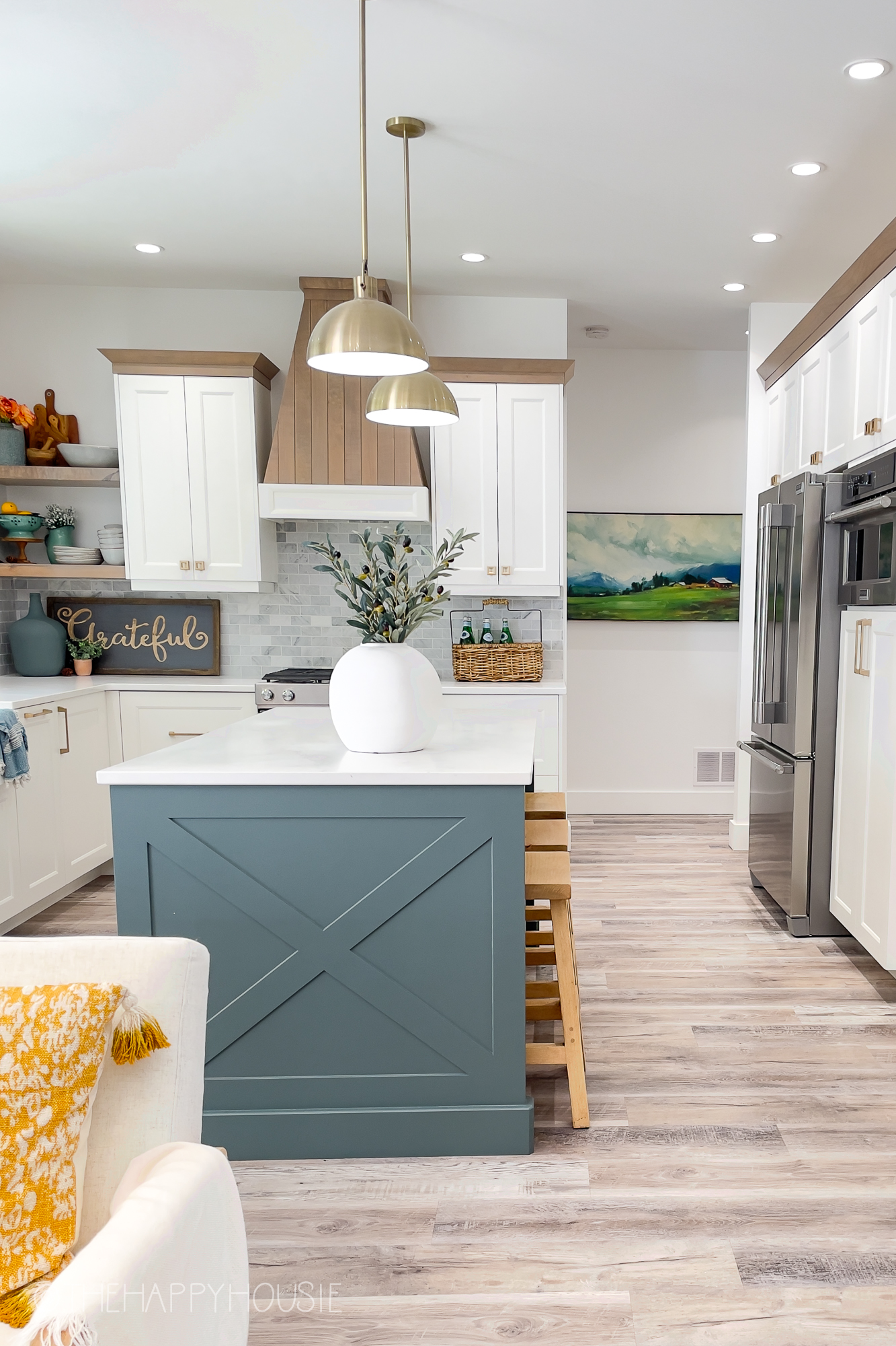 A modern farmhouse style kitchen packs of a lot of storage in a small footprint 