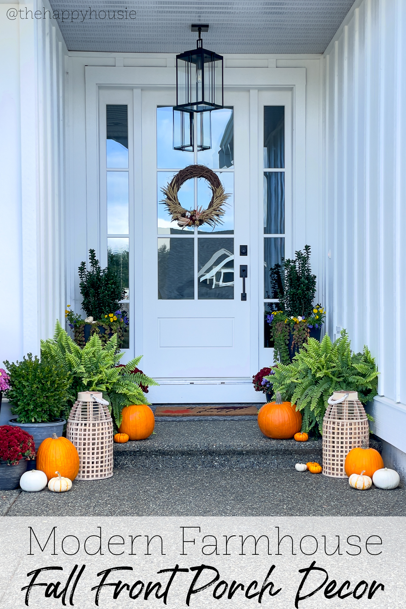 modern farmhouse front porch decorated for fall 