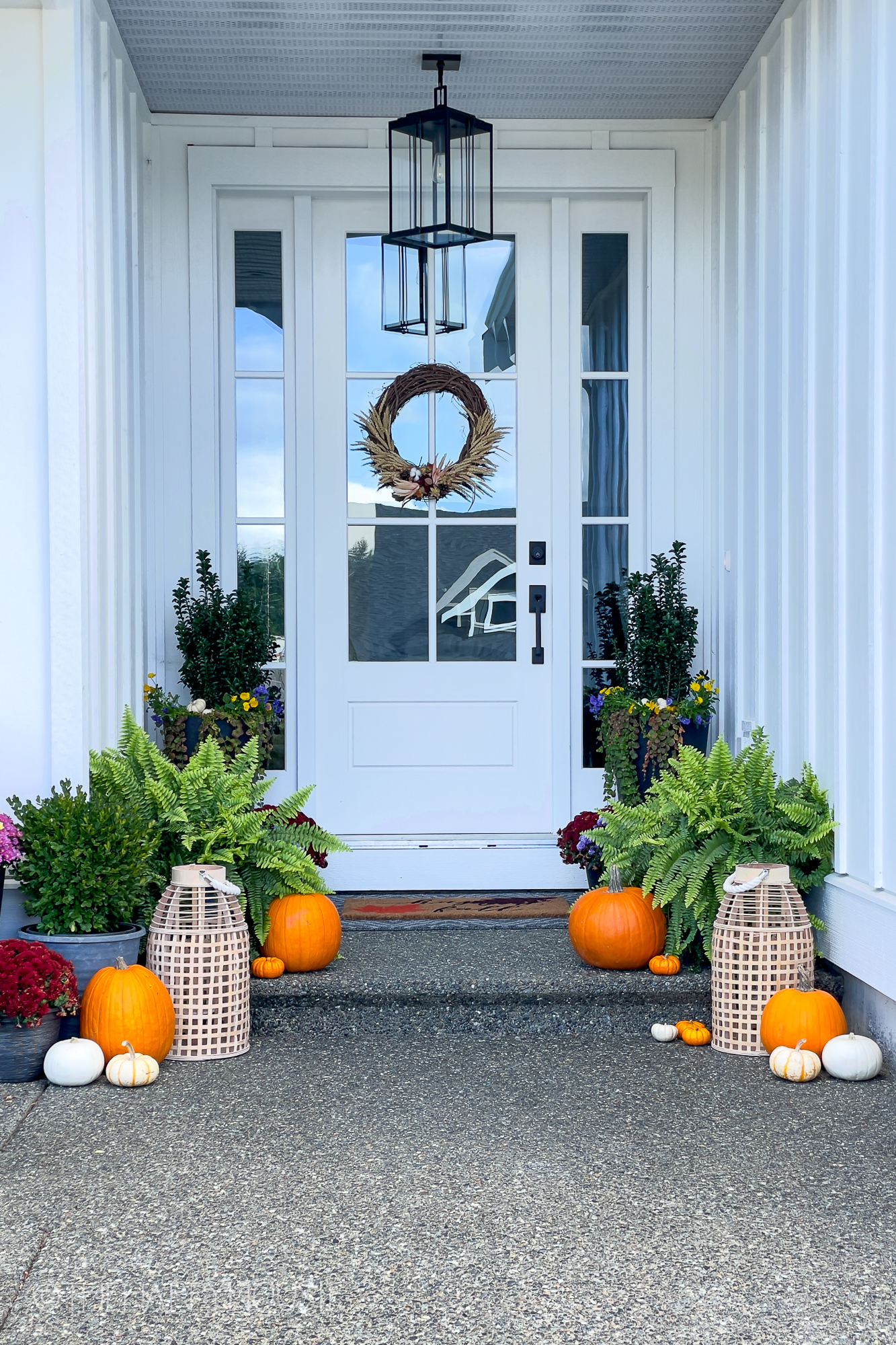 A small wreath is on the front door to the home.