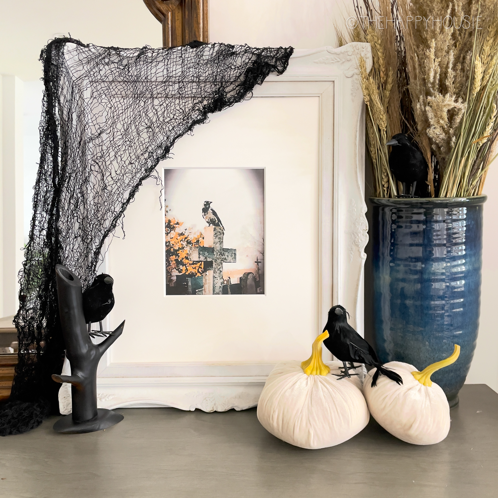 a styled image of a Halloween printable with pumpkins and crows