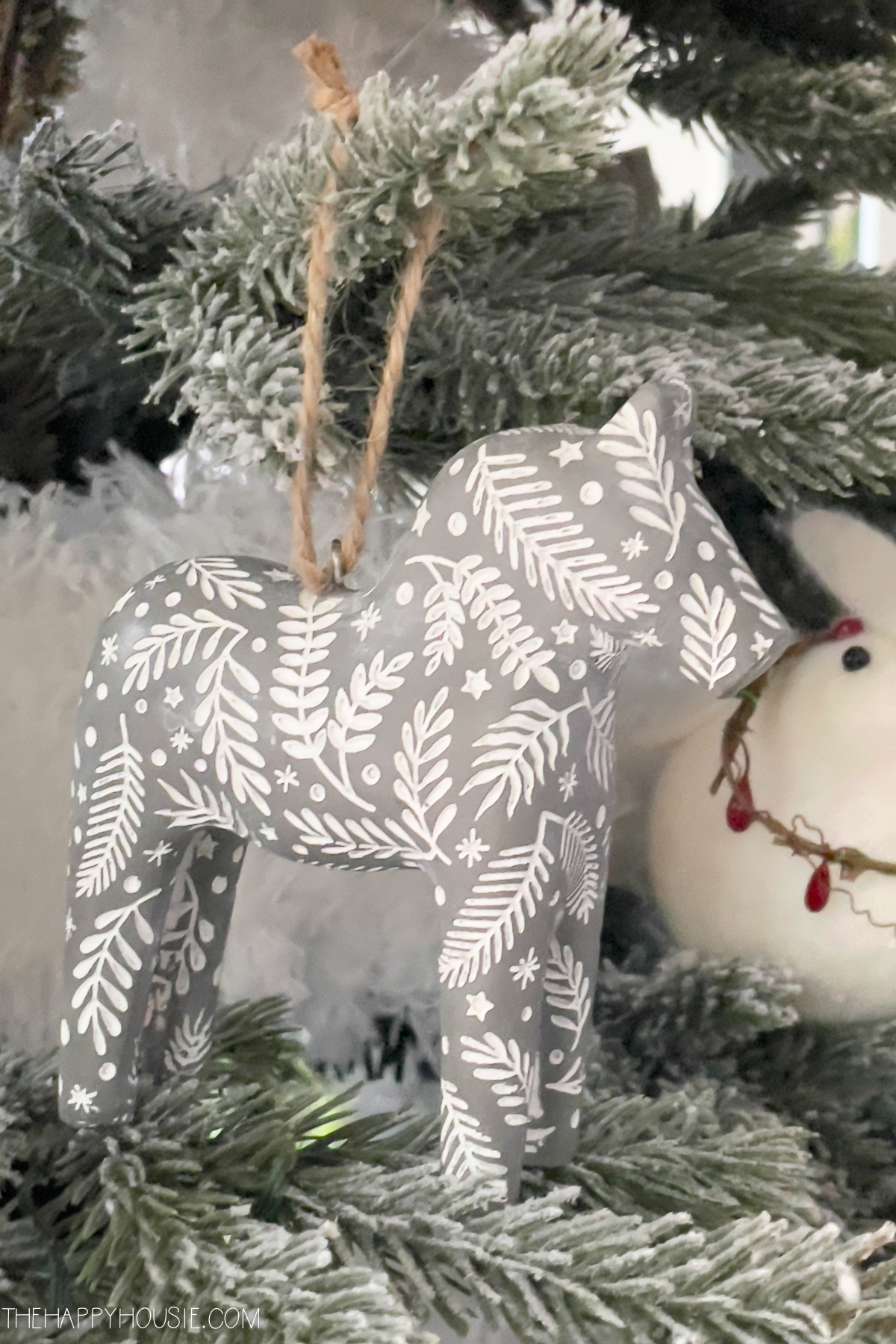 A scandi horse on the tree.