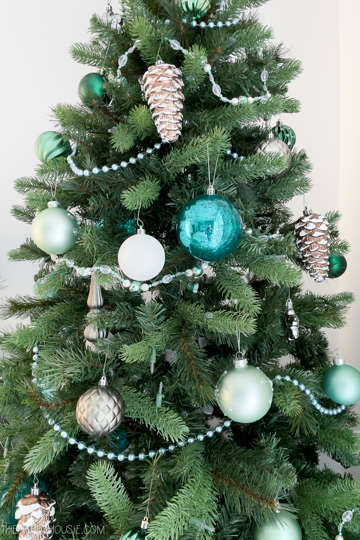 There are baubles on the tree.