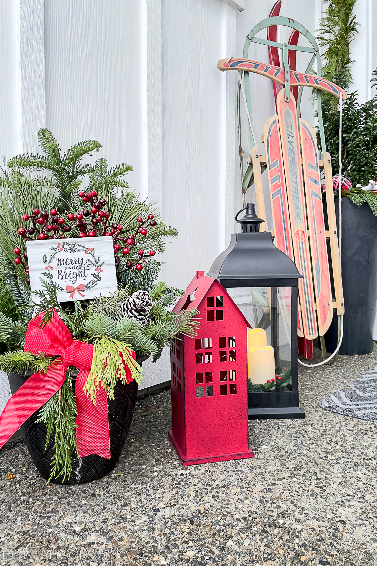 Cheerful Christmas Pots displayed on a front porch