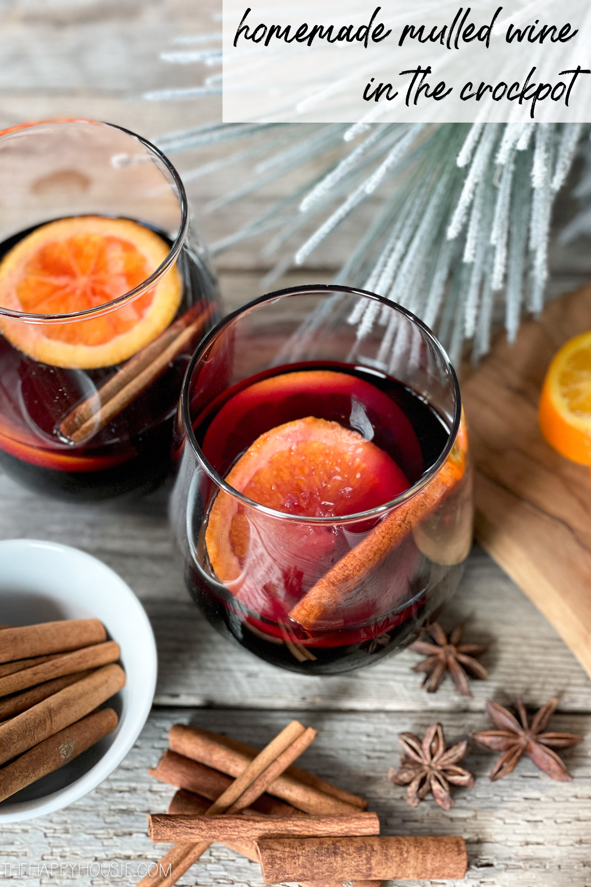Homemade spiced mulled wine garnished with orange slices and cinnamon