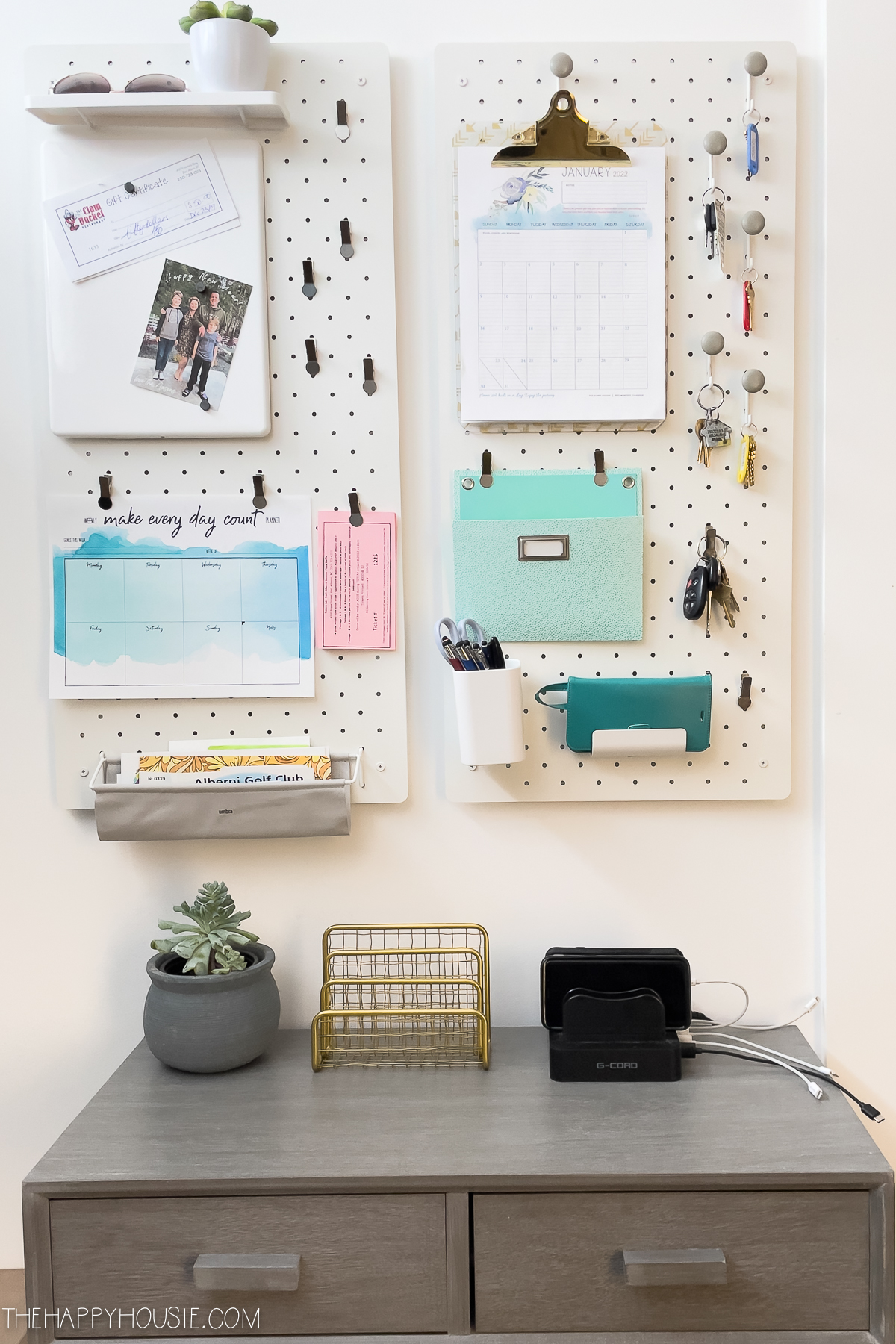 Pegboard organizer on the wall turned into a family command center.