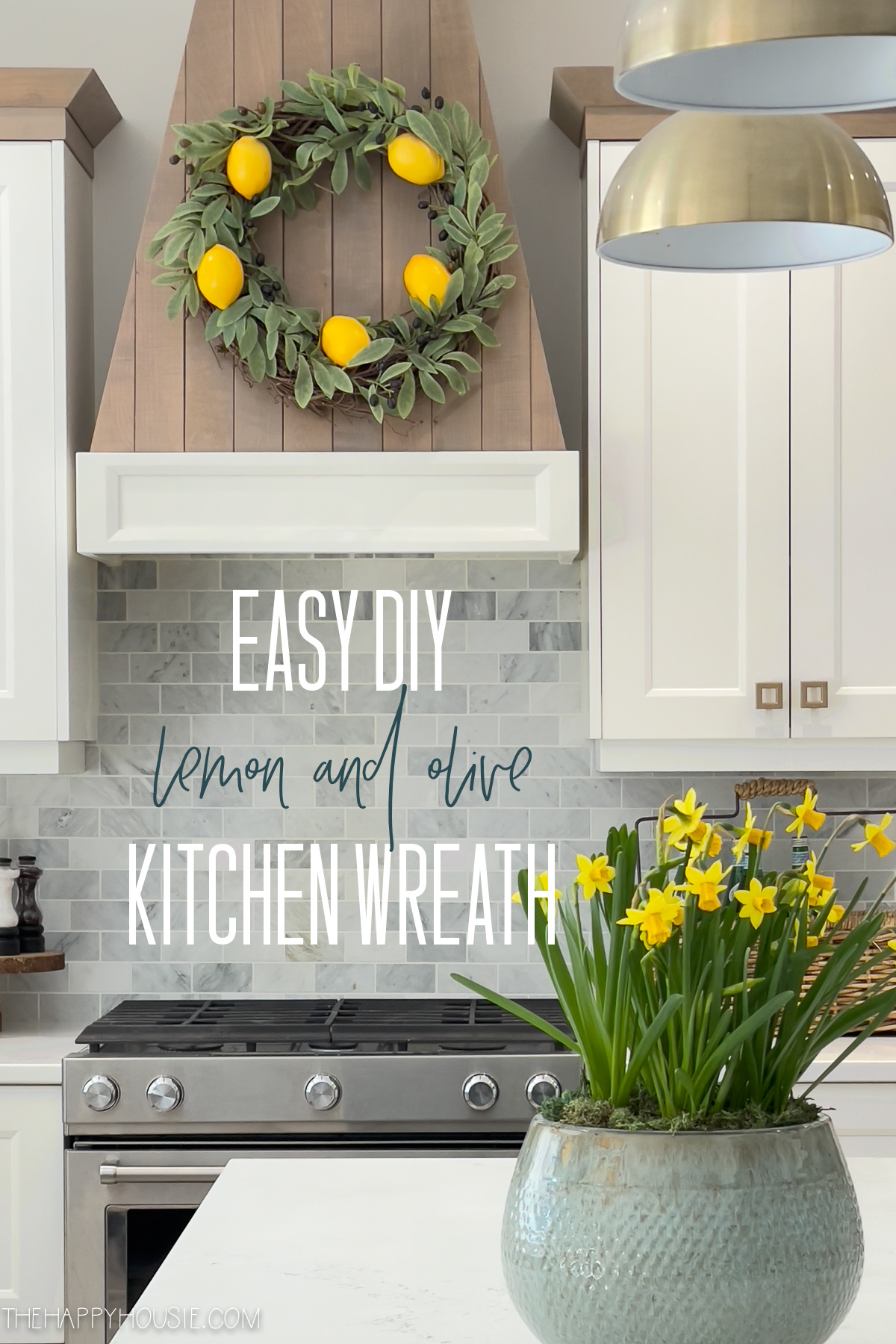 an olive branch and lemon spring kitchen wreath in a spring kitchen