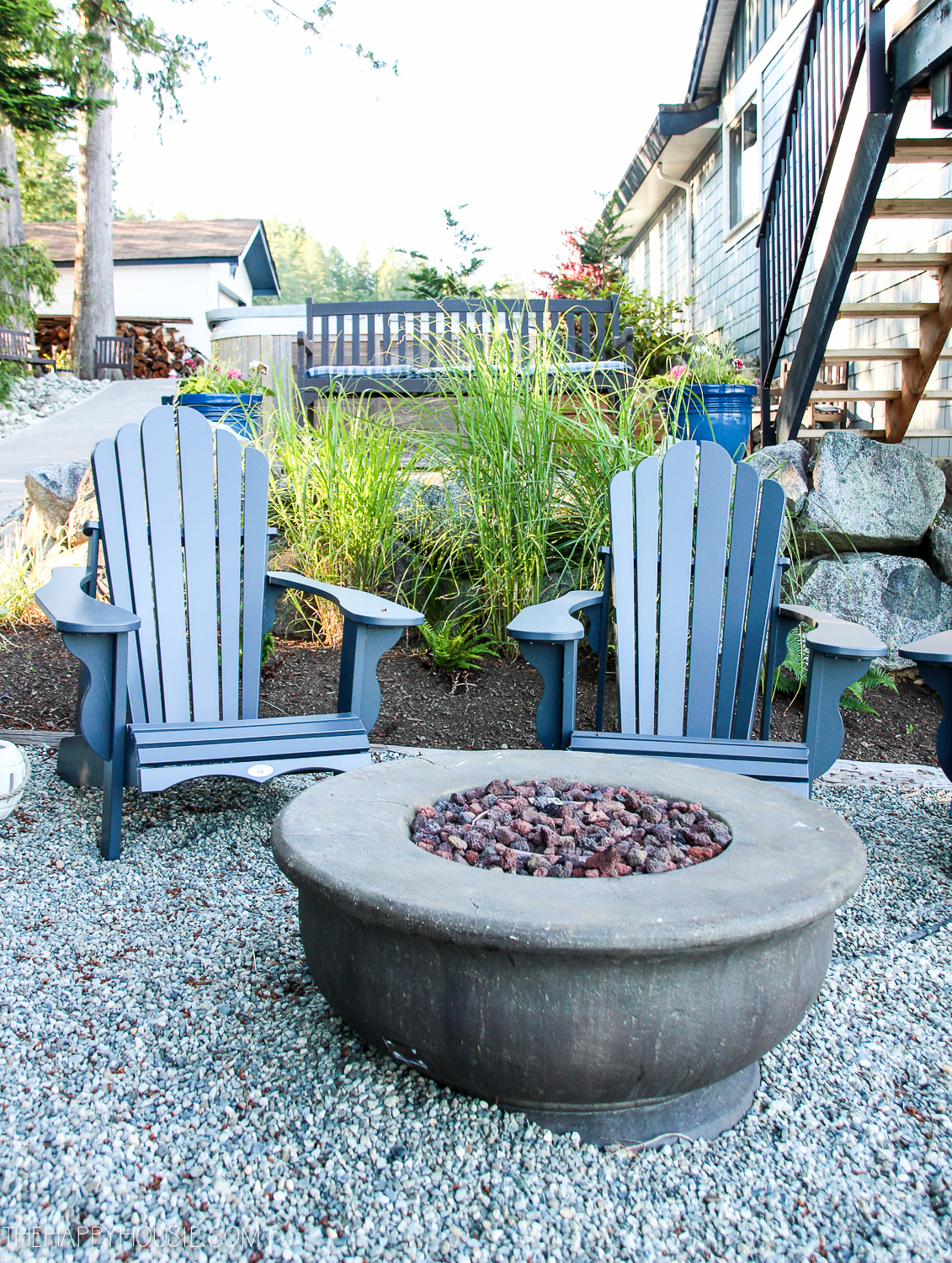 Adirondack chairs and a fire bowl sitting area